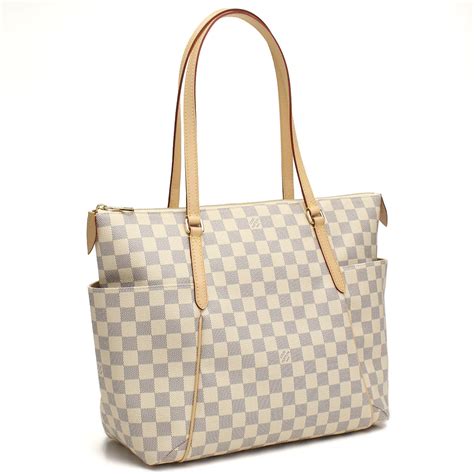 louis vuitton white checkered purse.